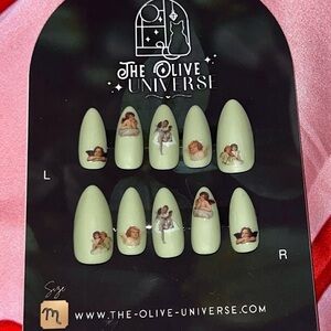 The Olive Universe Mint Green Press-On Nails with Cherub Decals